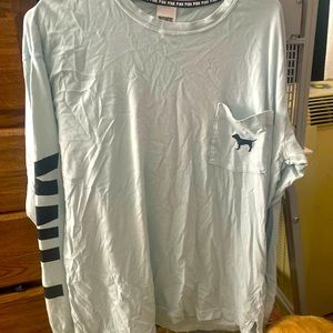 Light blue “Pink” long sleeved shirt will be washed before sent